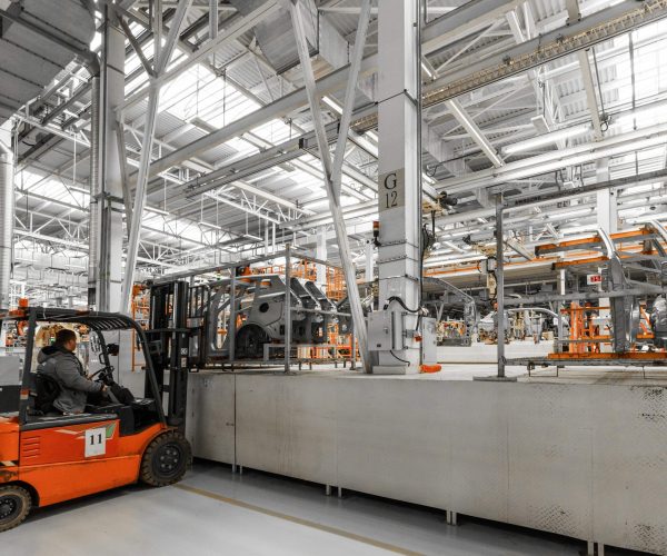 plant-production-cars-modern-automotive-industry-electric-car-factory-conveyor-min
